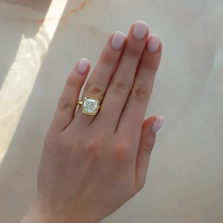 Club Ring Solitaire Engagement Ring With a Cushion Cut Diamond