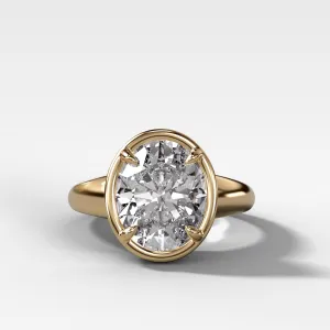 Club Ring Solitaire Engagement Ring With an Oval Cut Diamond