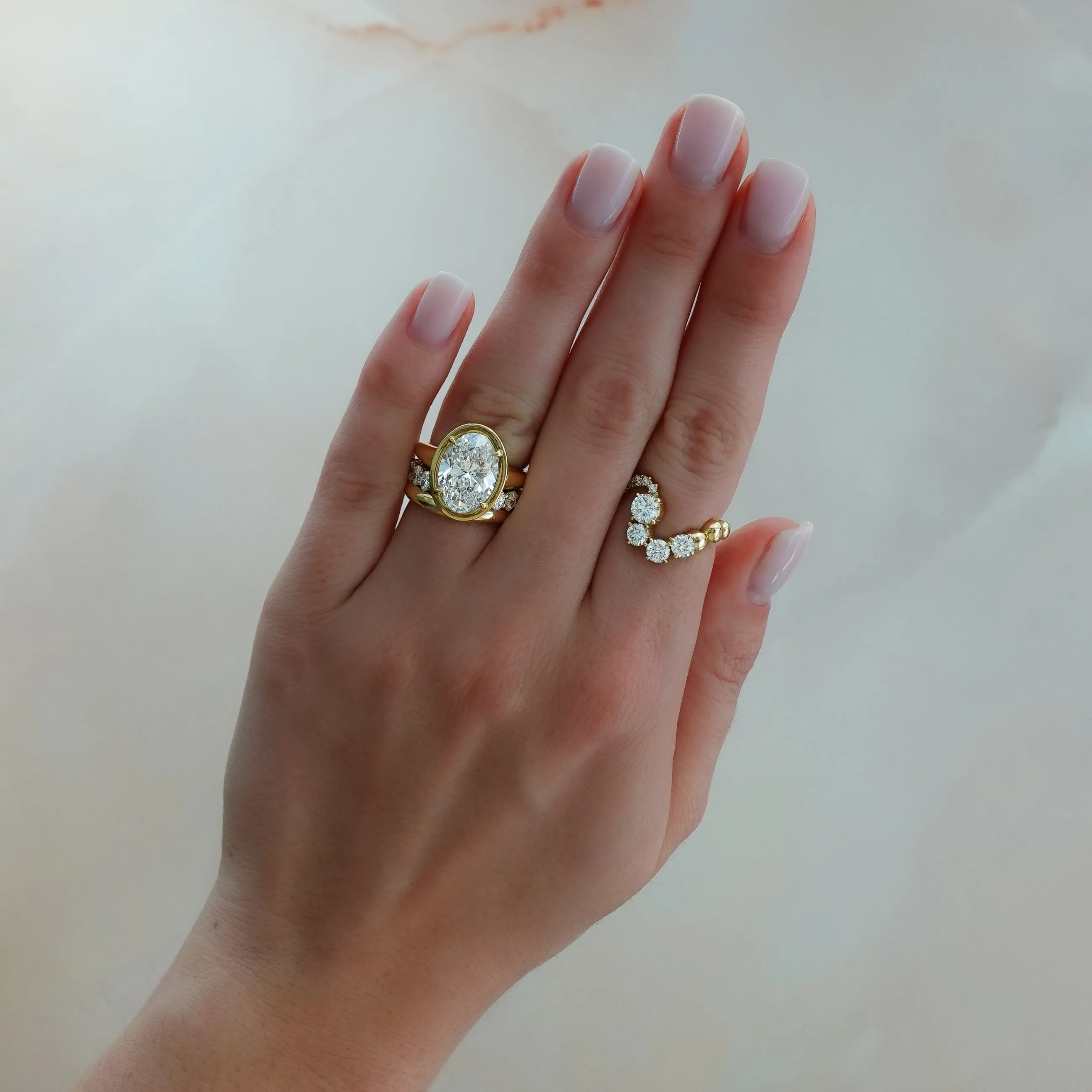 Club Ring Solitaire Engagement Ring With an Oval Cut Diamond