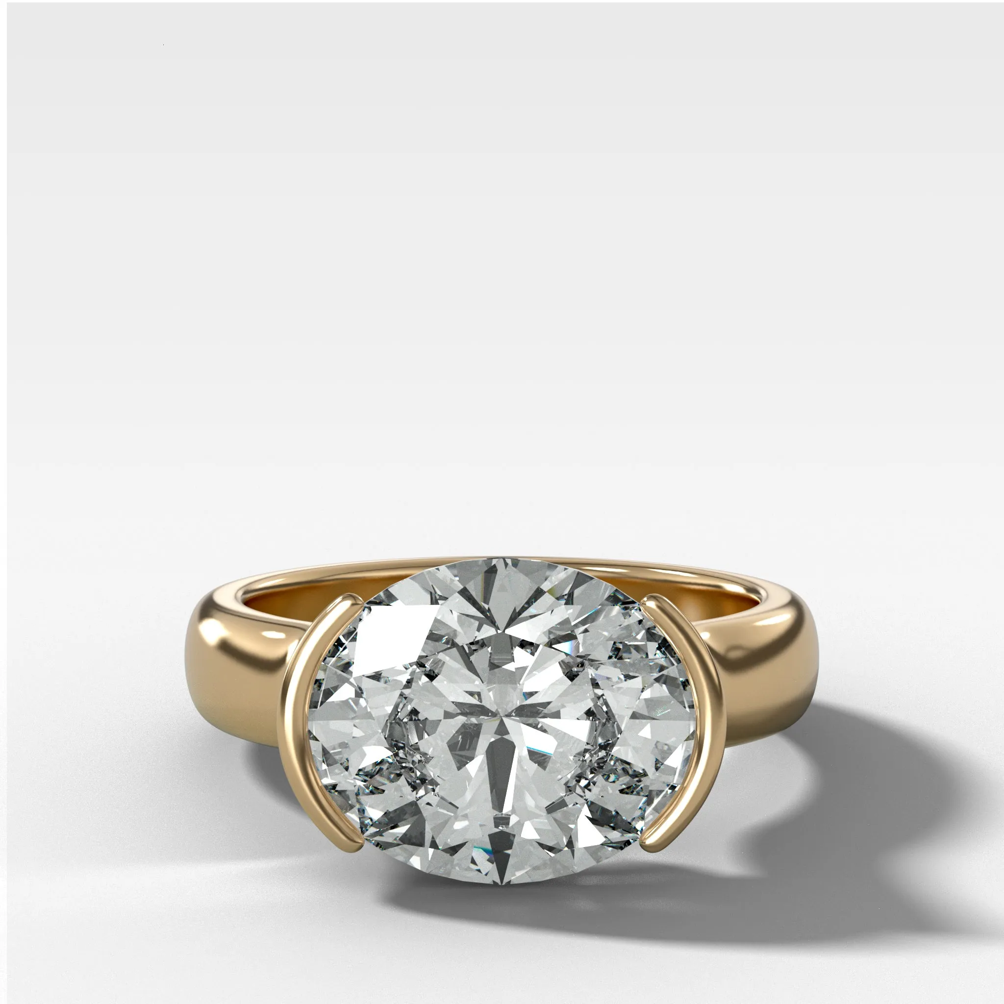 East West Half Bezel 4mm Solitaire Engagement Ring With Oval Cut Diamond