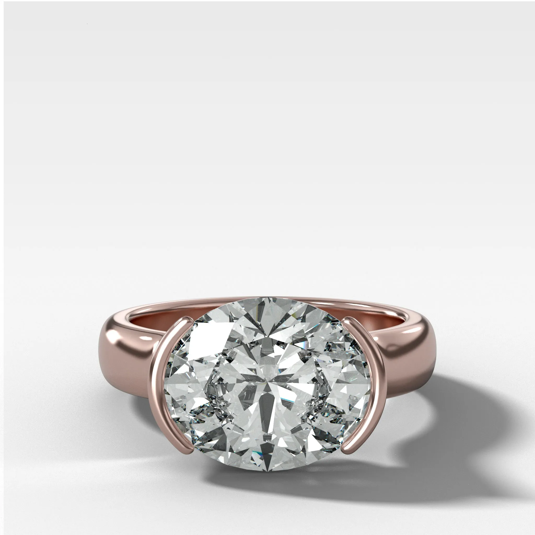 East West Half Bezel 4mm Solitaire Engagement Ring With Oval Cut Diamond